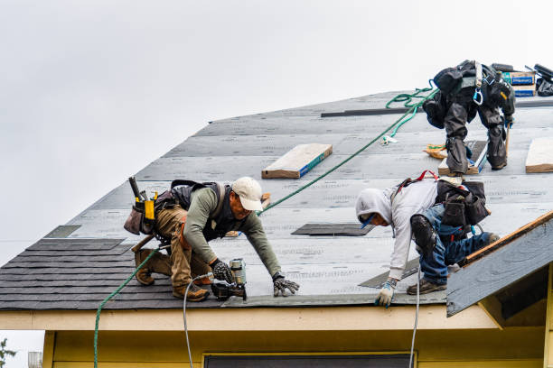 Professional Gutter Installation technician working in Guasti, CA
